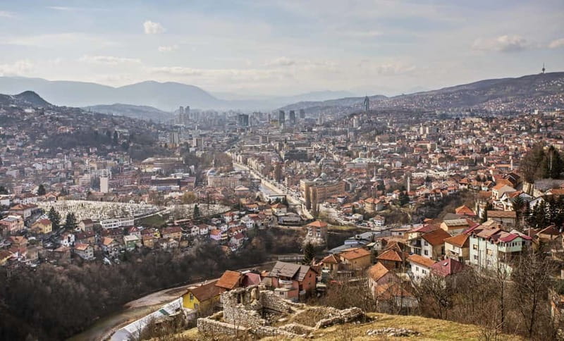 Sarajevo: A Siege Story - The Tunnel of Hope Experience - Sniper Alley from the van, how Sarajevo’s hardest street gets explained