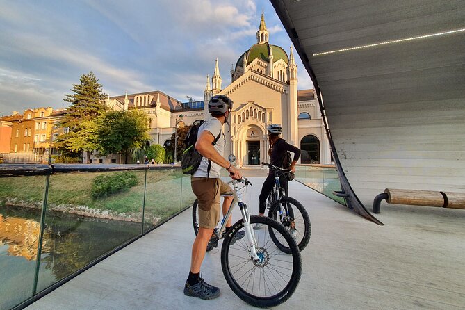 Sarajevo City SIghtseeing / War Bike Tour - Parliament Building: modern structure shaped by the Siege